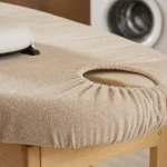 Housse table de massage coton-éponge beige avec cavité visage